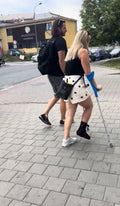 Woman braced ankle crutching video